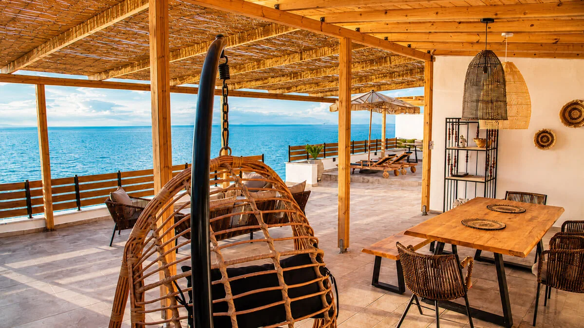 The sitting table with the view over the Aegean