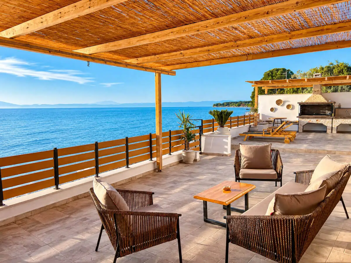 A panoramic view over the sitting area and the Aegean in front